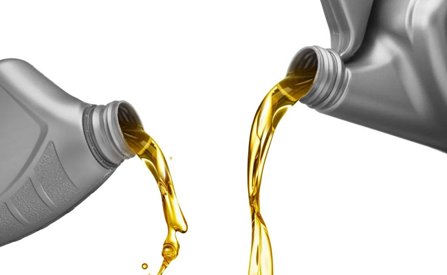 What are the causes of oil emulsification in air compressors